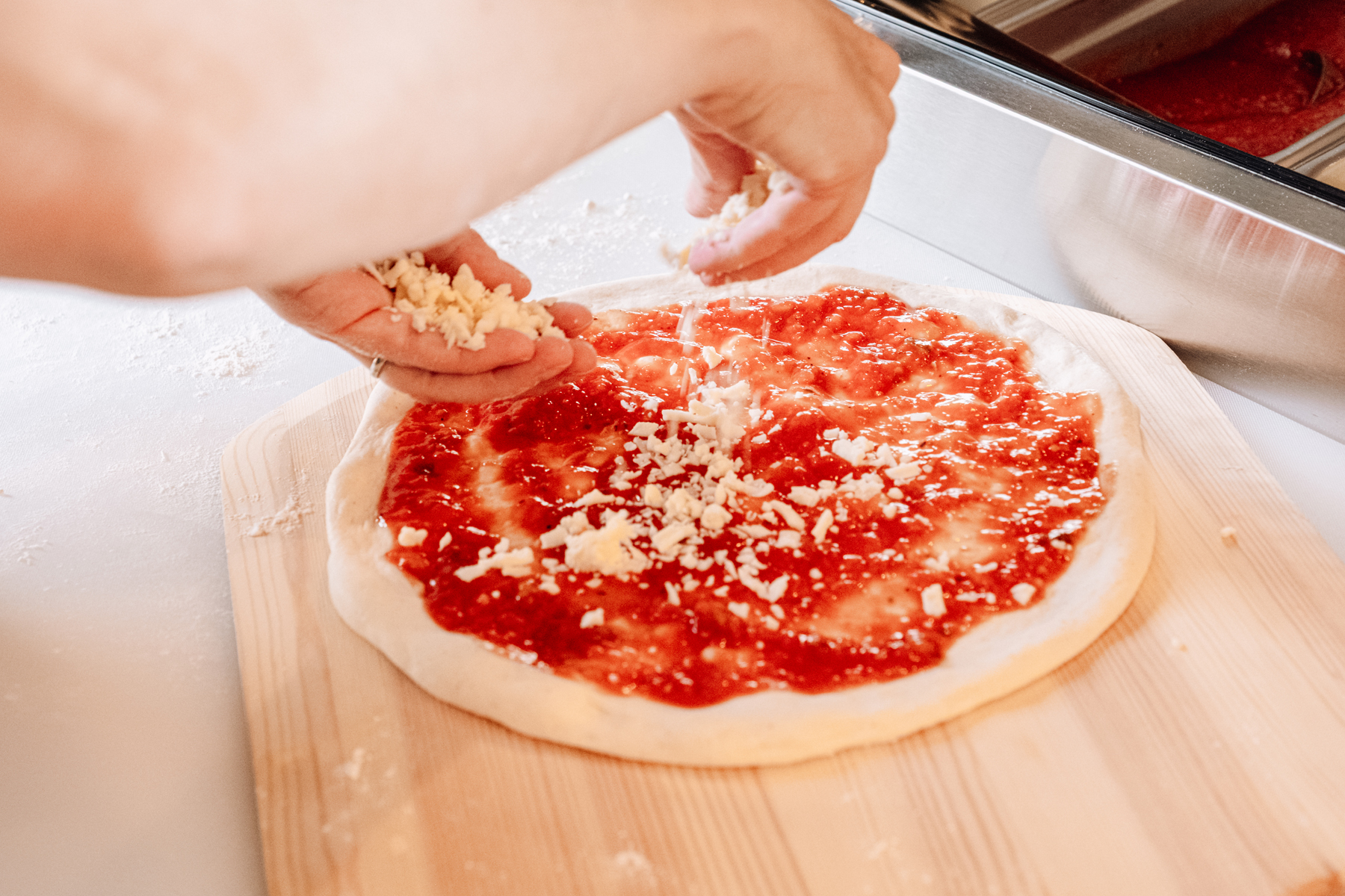 Forno Making Pizza